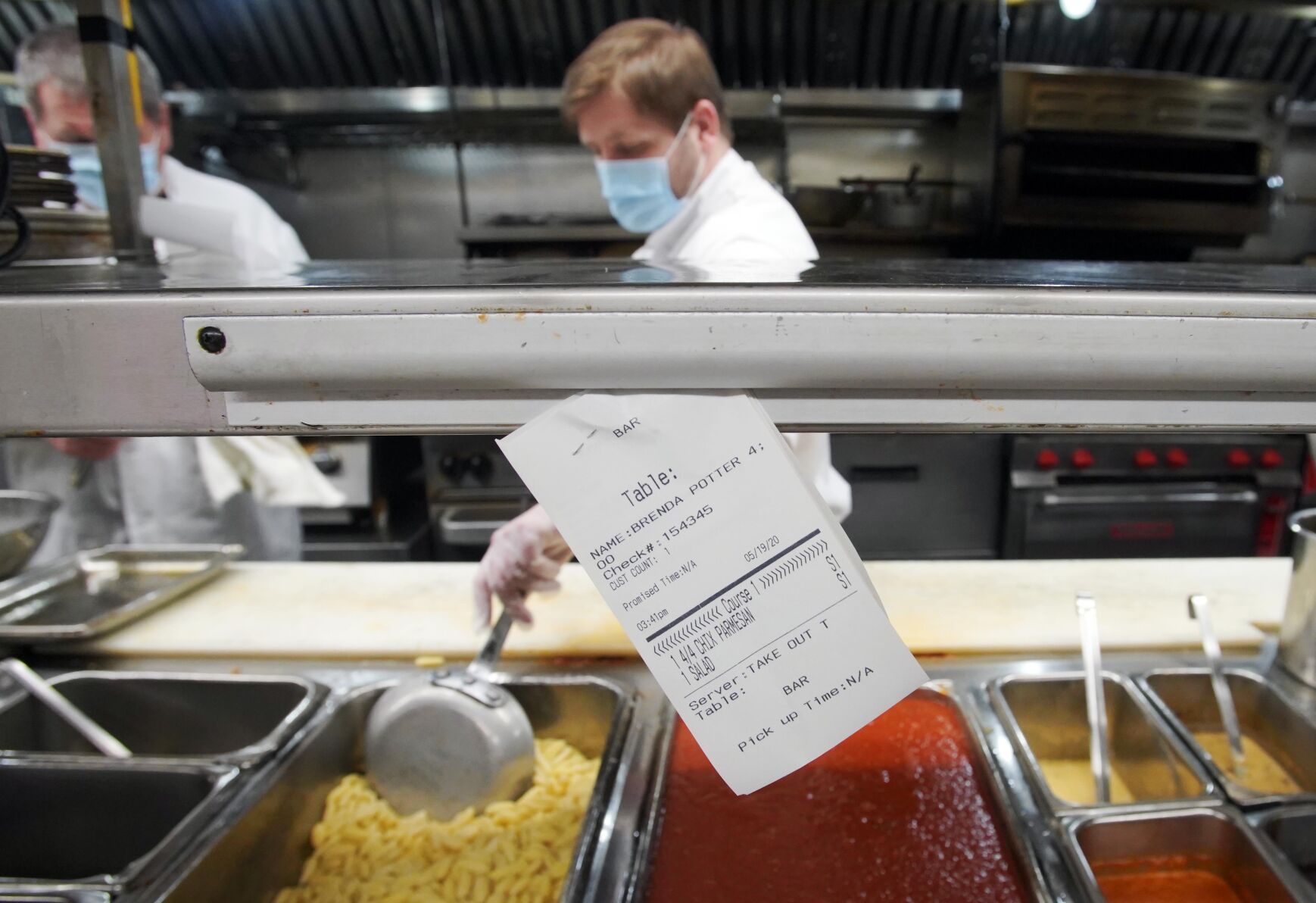 Man works in kitchen
